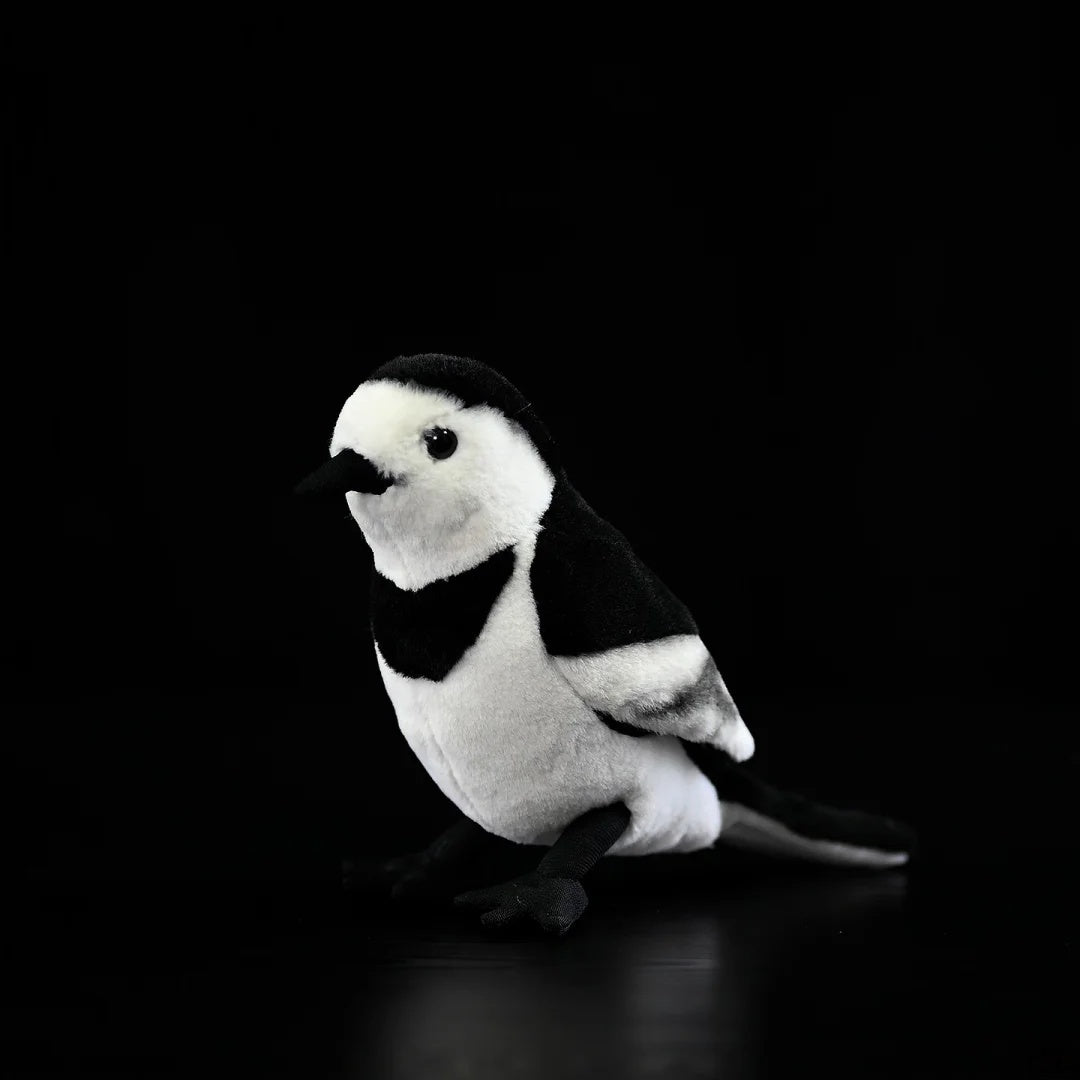 Side view of the lifelike White Wagtail plush by SoftDaysLab®, perfect for bird enthusiasts and nature lovers