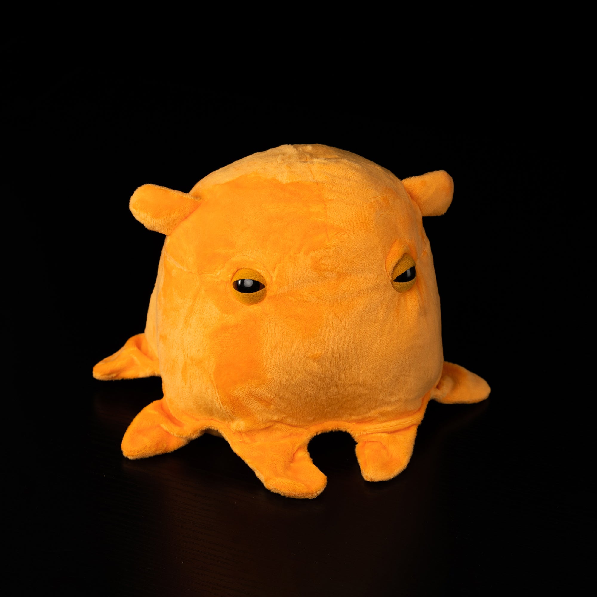 Front-facing Dumbo Octopus plush by SoftDaysLab® in vibrant orange, cozy gift for fans of ocean creatures