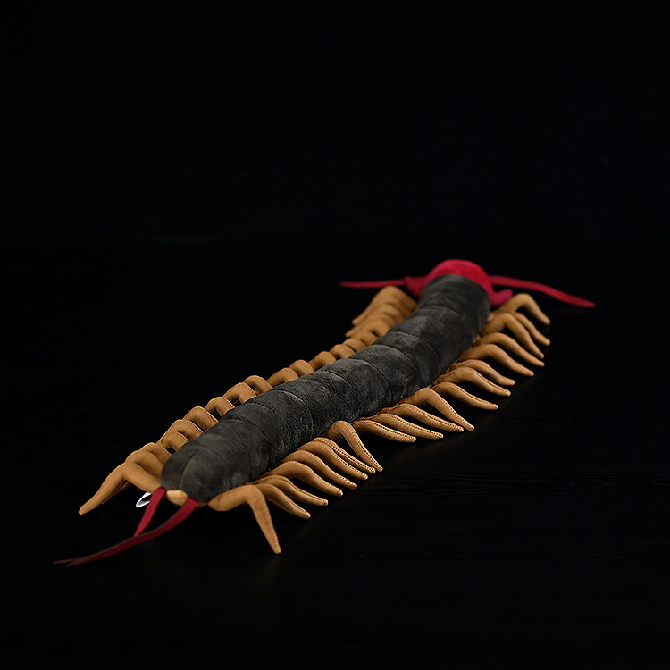 Rear view of Chinese red-headed centipede plush, highlighting its segmented body and soft fabric legs
