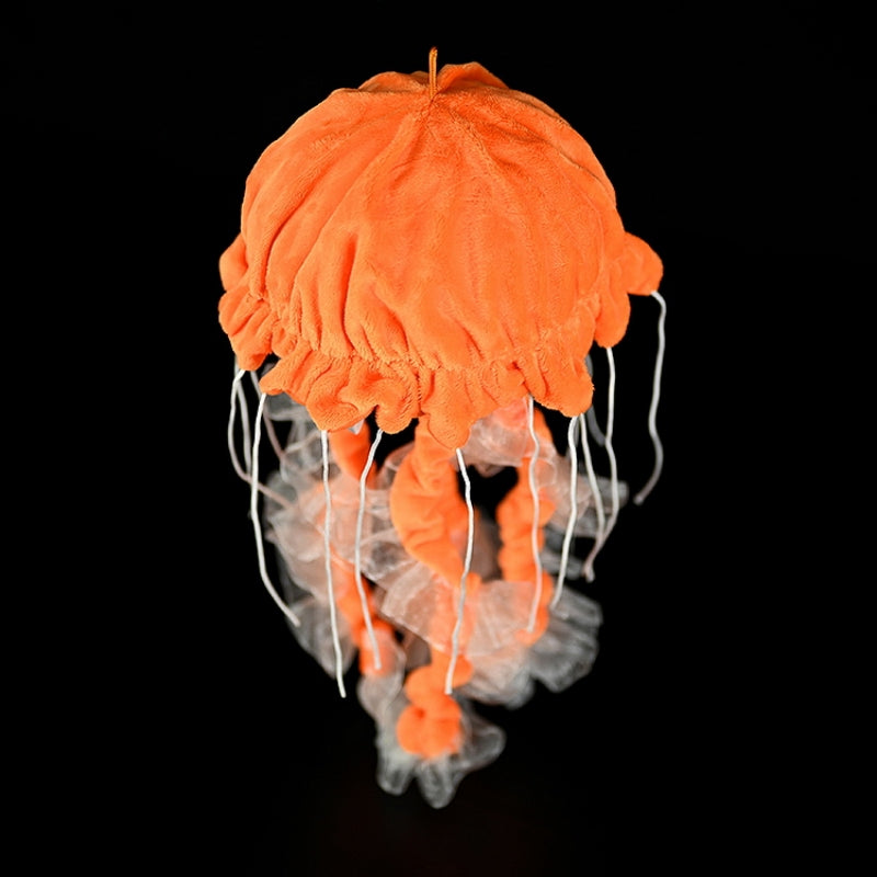 Top view of Pacific sea nettle jellyfish stuffed toy, highlighting lifelike bell texture and ribbon-like tentacles