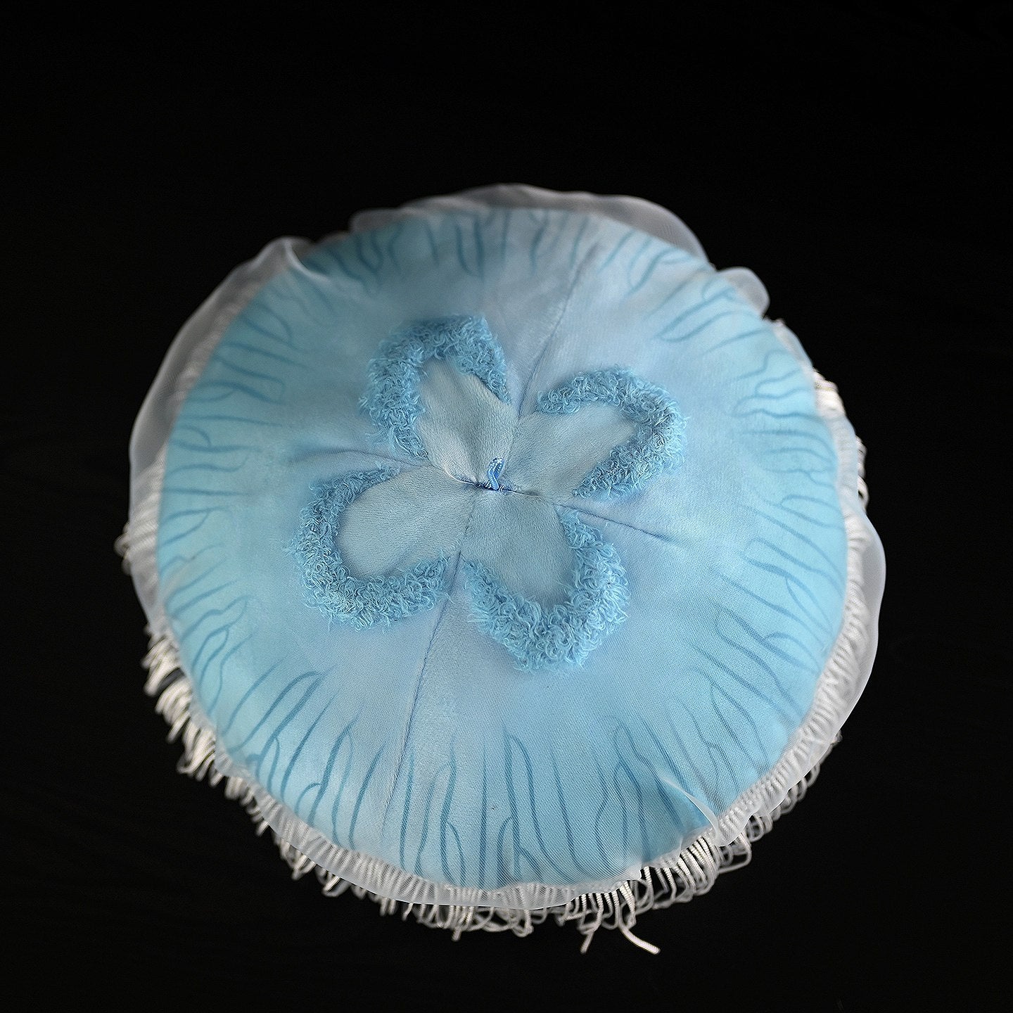 Detailed view of the lifelike moon jellyfish plush's top pattern with translucent design, mimicking nature by SoftDaysLab