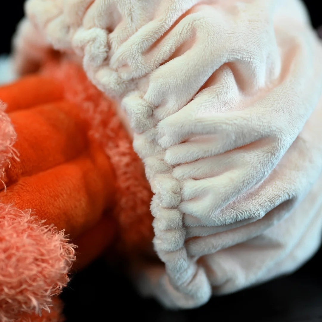 Close-up of the flame jellyfish plush toy's soft, detailed bell for a lifelike appearance
