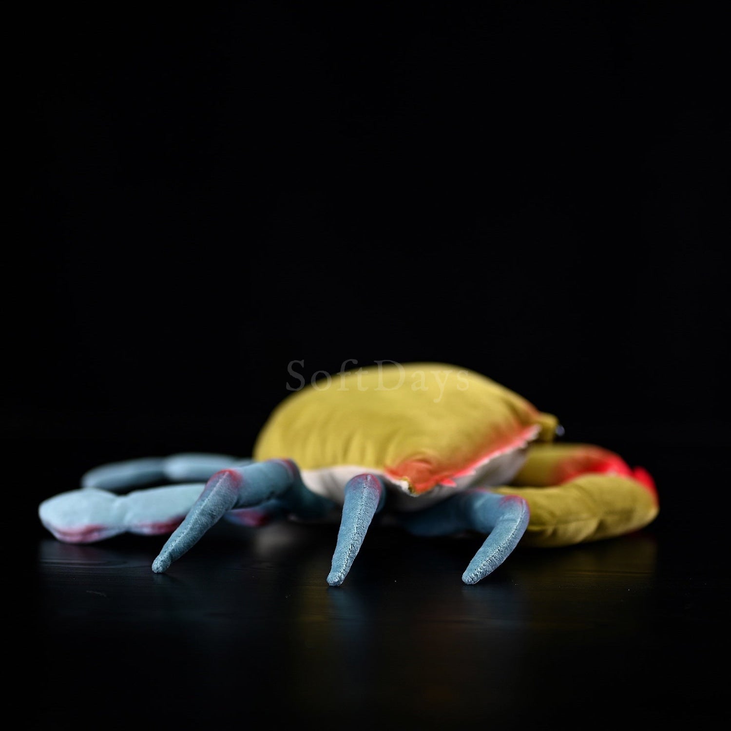 Back view of a Blue Crab plush toy showcasing its soft texture and realistic details for ocean lovers