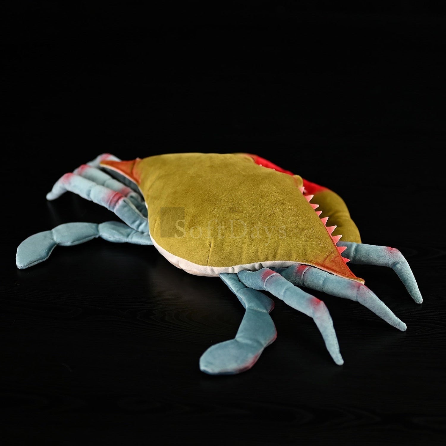 Top view of a Blue Crab stuffed animal, designed with intricate details and vivid colors for nature enthusiasts