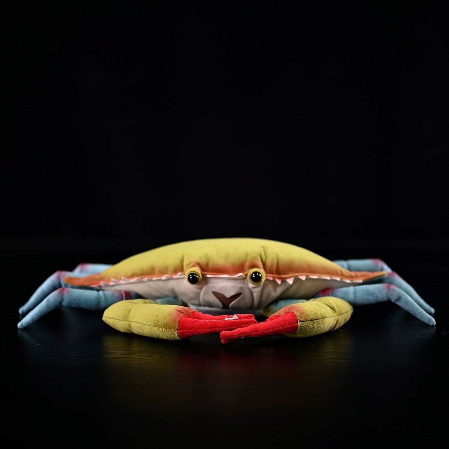 Front view of a Blue Crab plush toy with adorable eyes and vibrant colors, perfect for collectors or kids