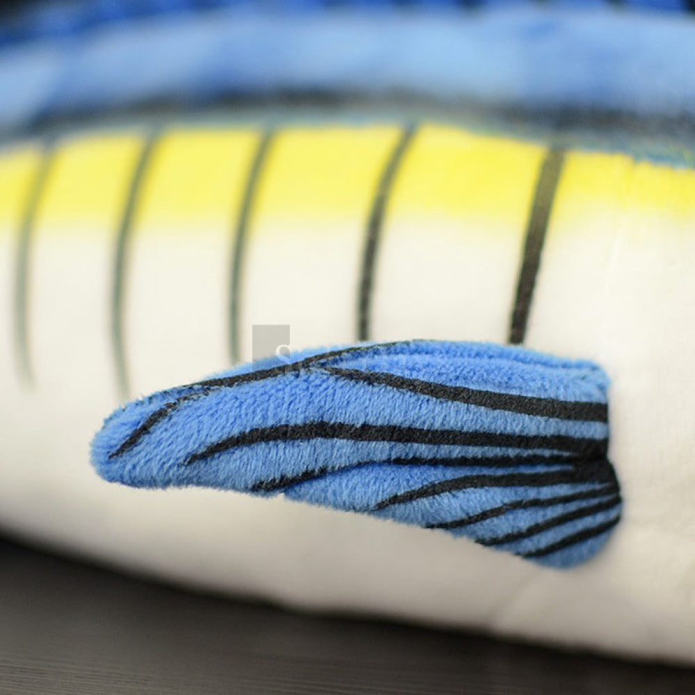Detailed view of Blue Marlin’s plush fin, vibrant blue and yellow fabric, perfect marine-themed gift