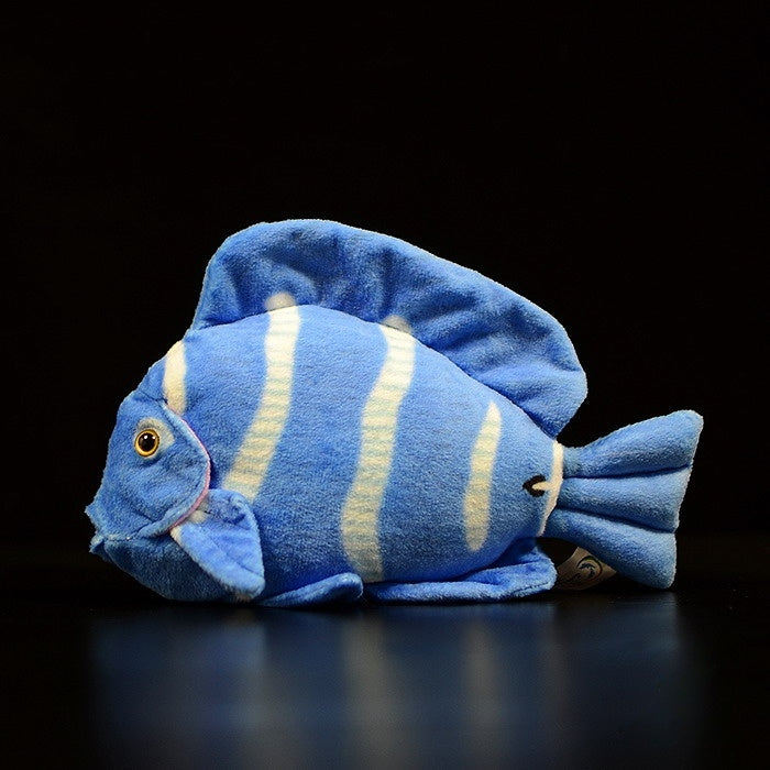 Realistic plush toy of a vibrant blue tang fish with lifelike details, soft texture by SoftDaysLab