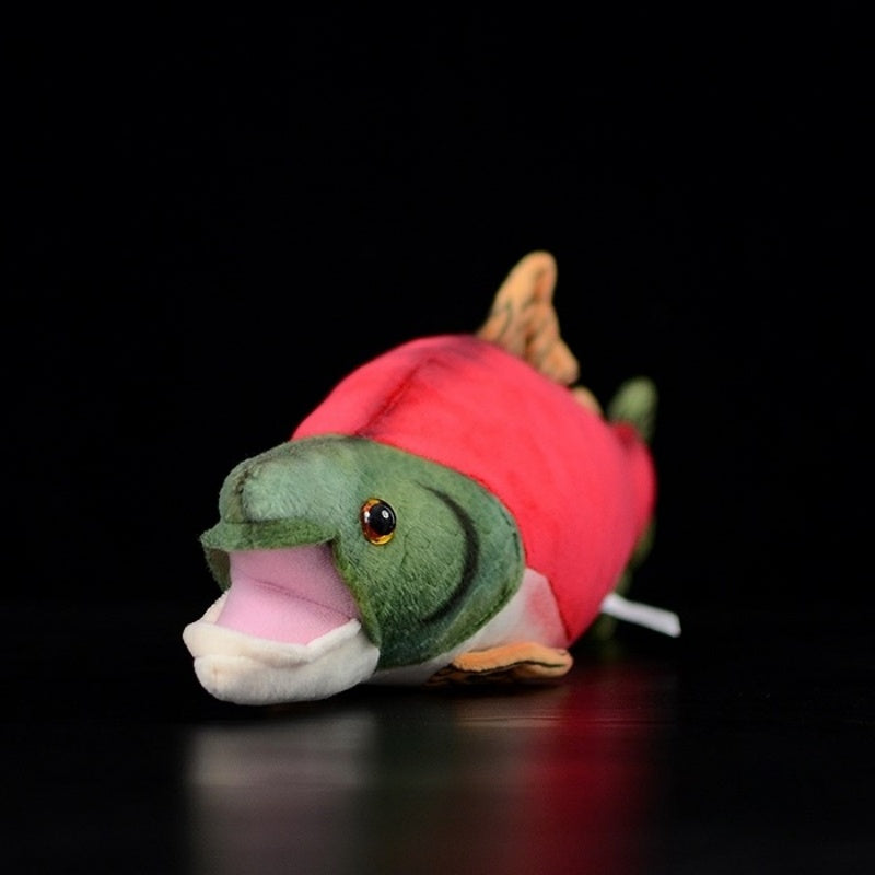 Front view of a lifelike sockeye salmon plush toy showcasing its detailed face and open mouth