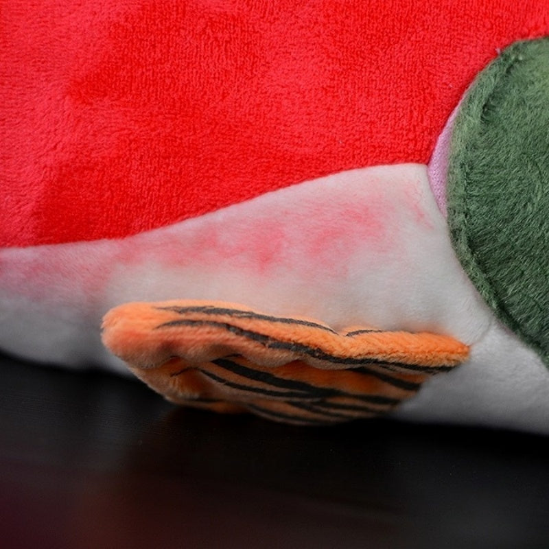 Detailed close-up of the sockeye salmon plush toy’s side fin with striped patterns