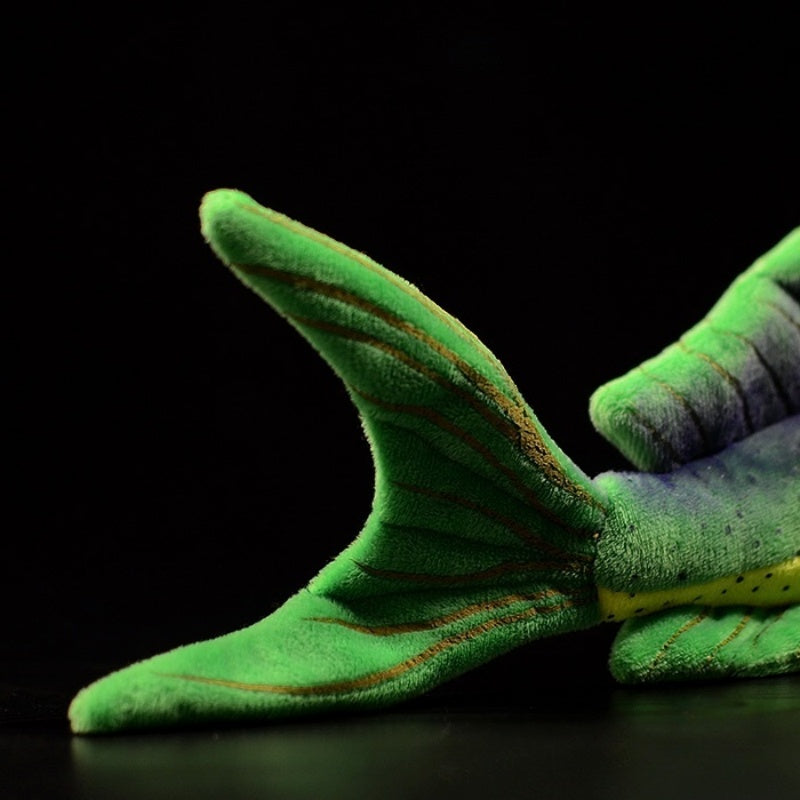 Tail detail of Mahi Mahi plush toy, showcasing realistic shape and vibrant green design