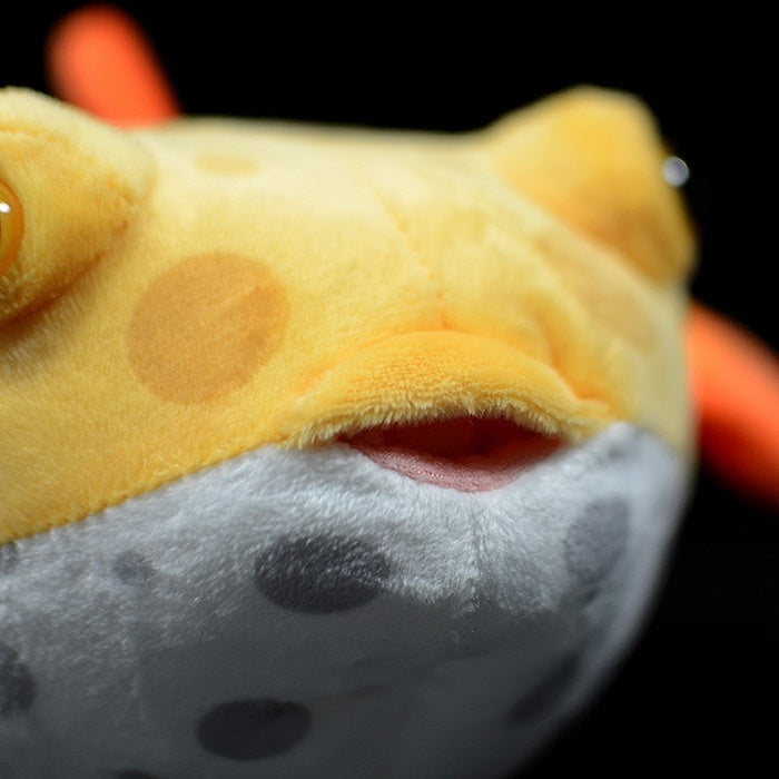 Close-up of the Eastern Smooth Boxfish plush's mouth and spotted belly, showing its realistic texture