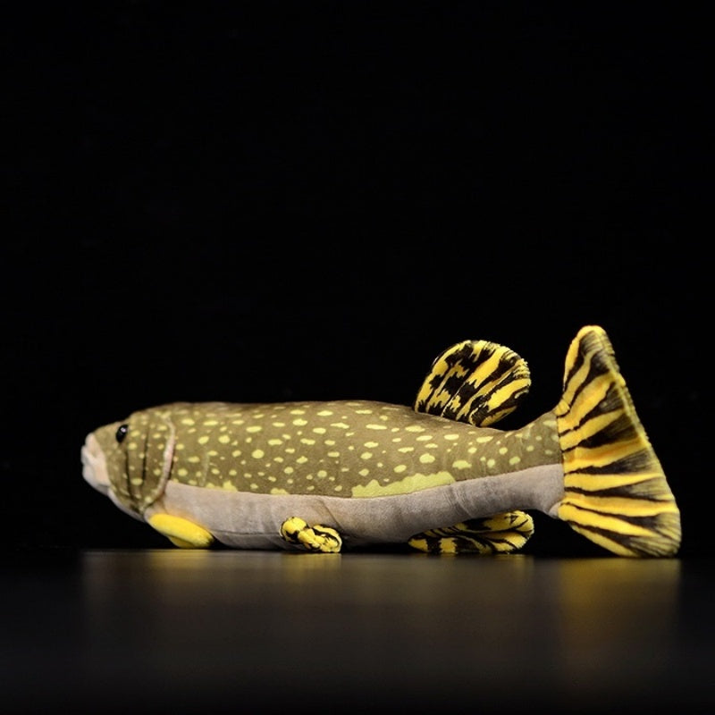 Rear angled view of northern pike plush toy featuring vibrant yellow and black striped tail