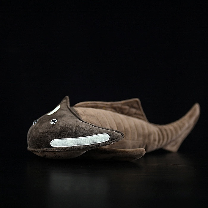 Side view of Cephalaspis plush toy showcasing realistic head armor and detailed body design by SoftDaysLab