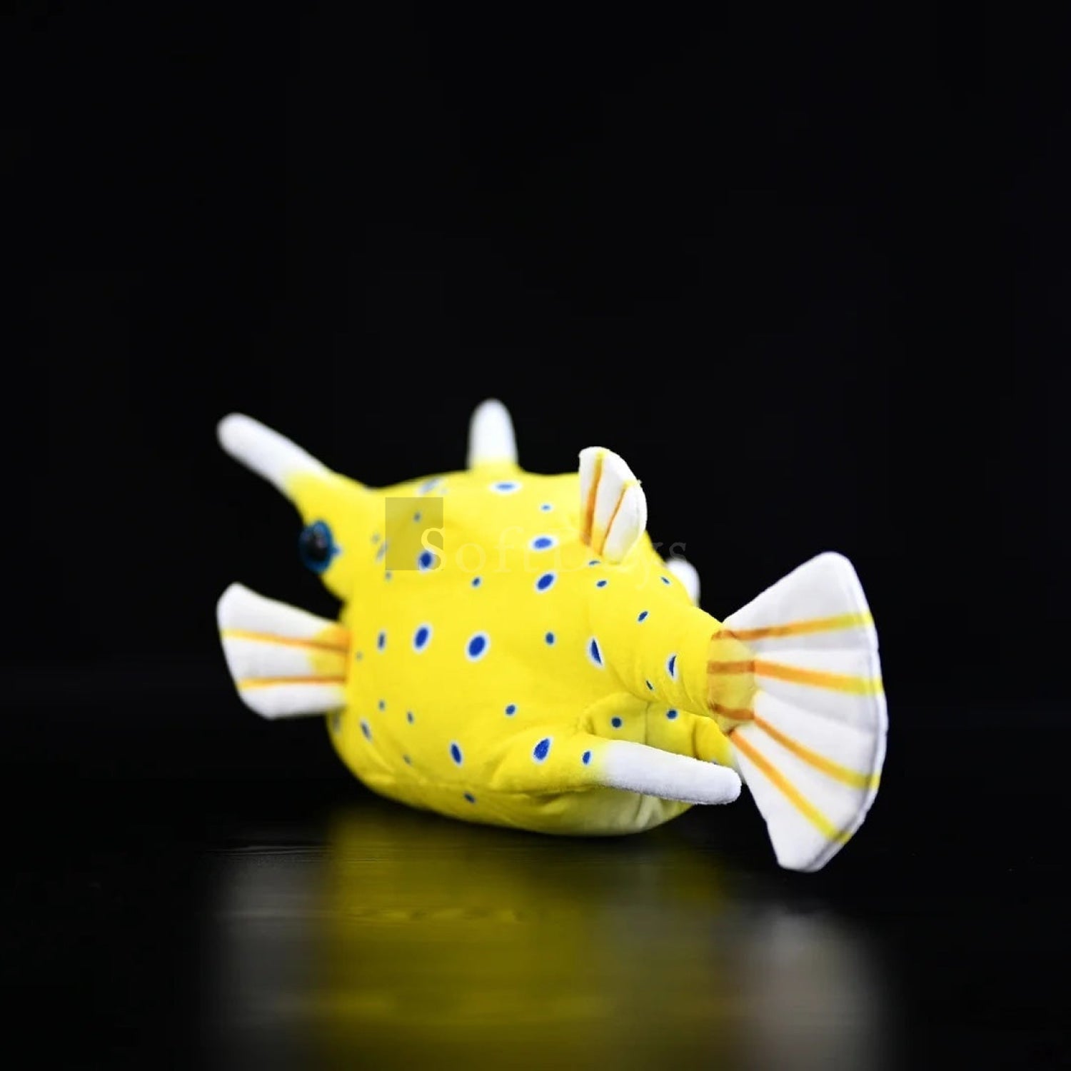 Rear view of Longhorn Cowfish plush toy, highlighting its tail and lifelike marine design