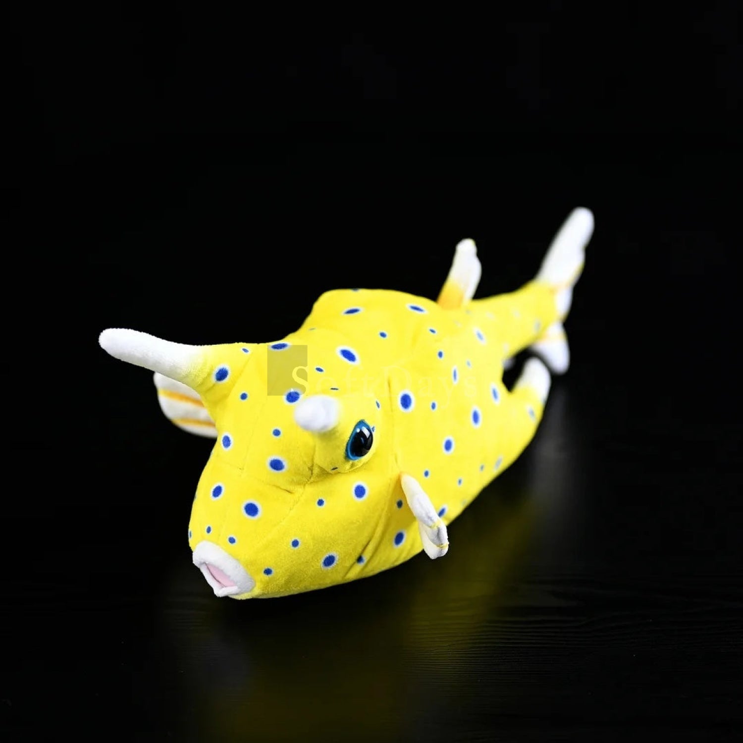 Angled view of lifelike Longhorn Cowfish plush toy, featuring its charming horns and detailed craftsmanship