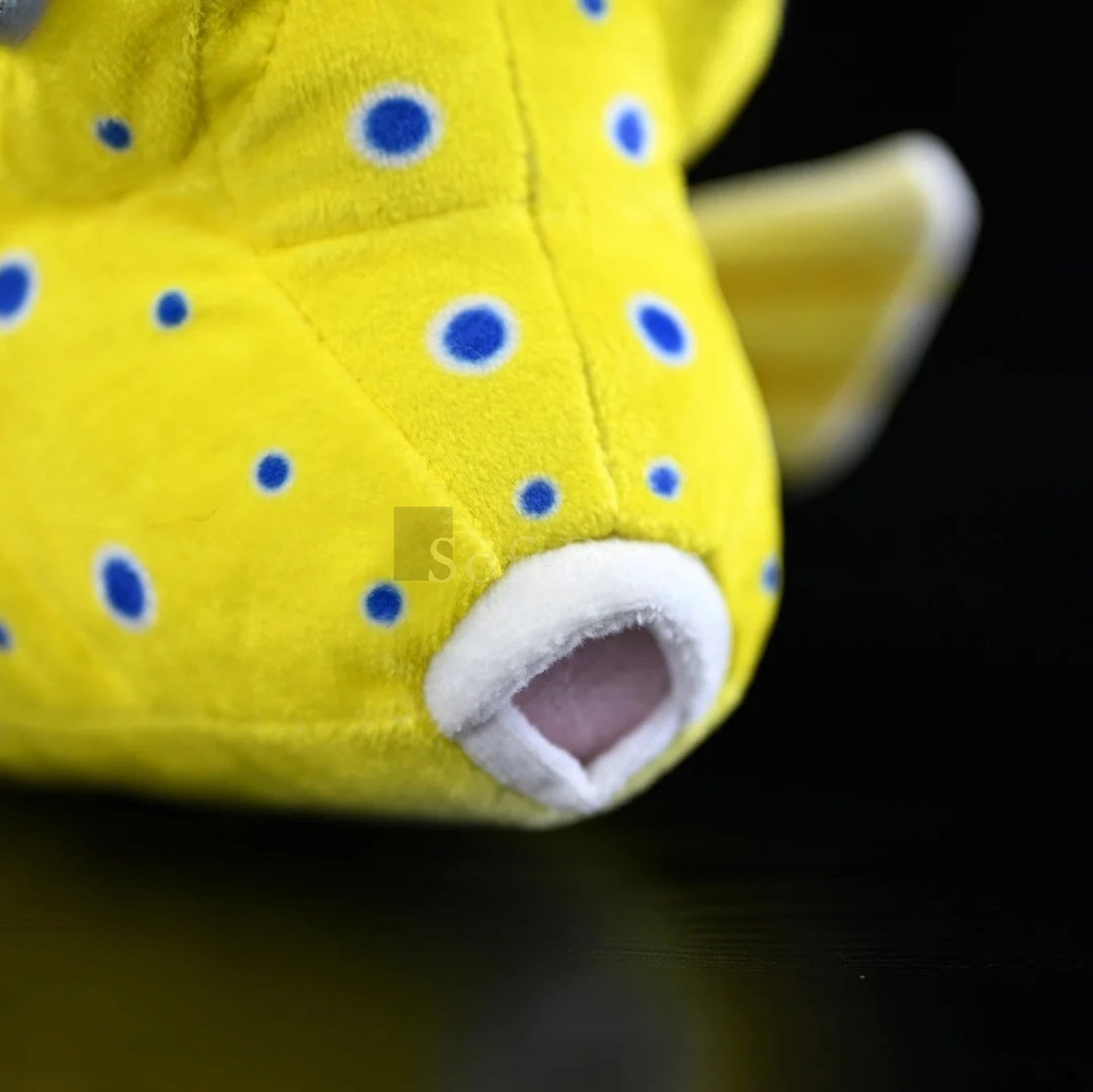 Close-up of lifelike Longhorn Cowfish plush toy’s mouth with soft, detailed stitching