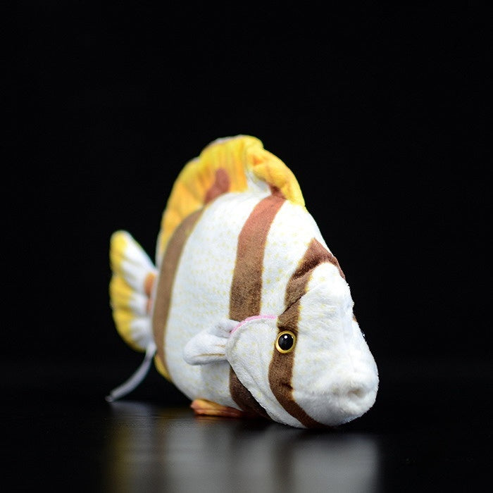 Angled view of a Four-banded Butterflyfish plush, highlighting its lifelike design and vibrant colors