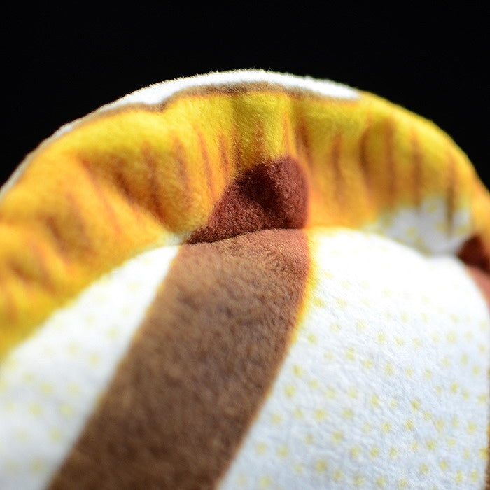 Detailed close-up of the dorsal fin of a Four-banded Butterflyfish plush with vivid yellow accents