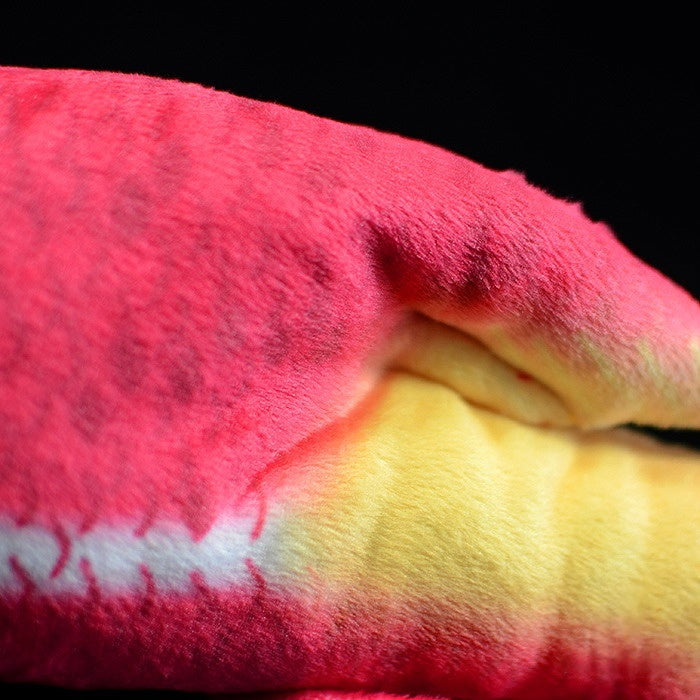 Close-up of the Cuban Spotfin Hogfish plush's body, highlighting its vibrant red and yellow gradient
