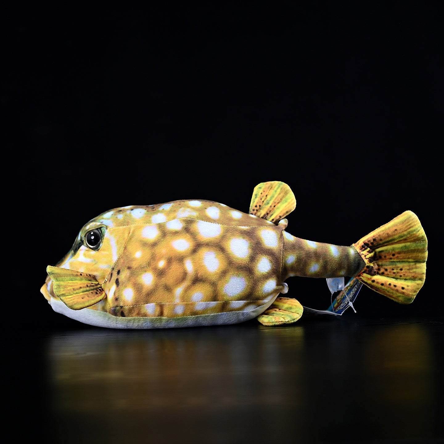 Side view of Immaculate Boxfish Plush with realistic textures and spotted design for marine enthusiasts