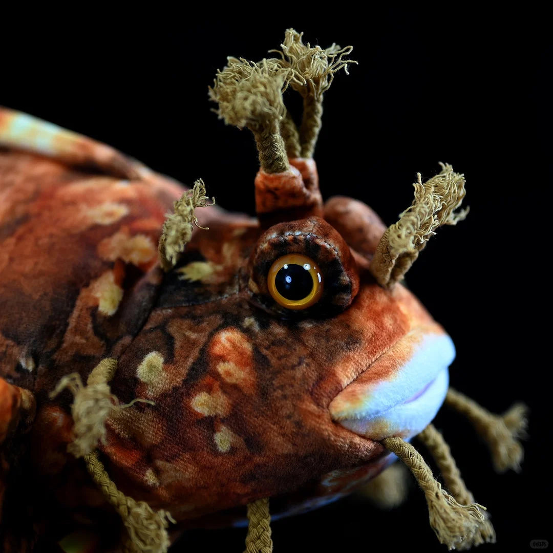 Side profile of Japanese Warbonnet plush with intricate cirri and vibrant marine-inspired colors