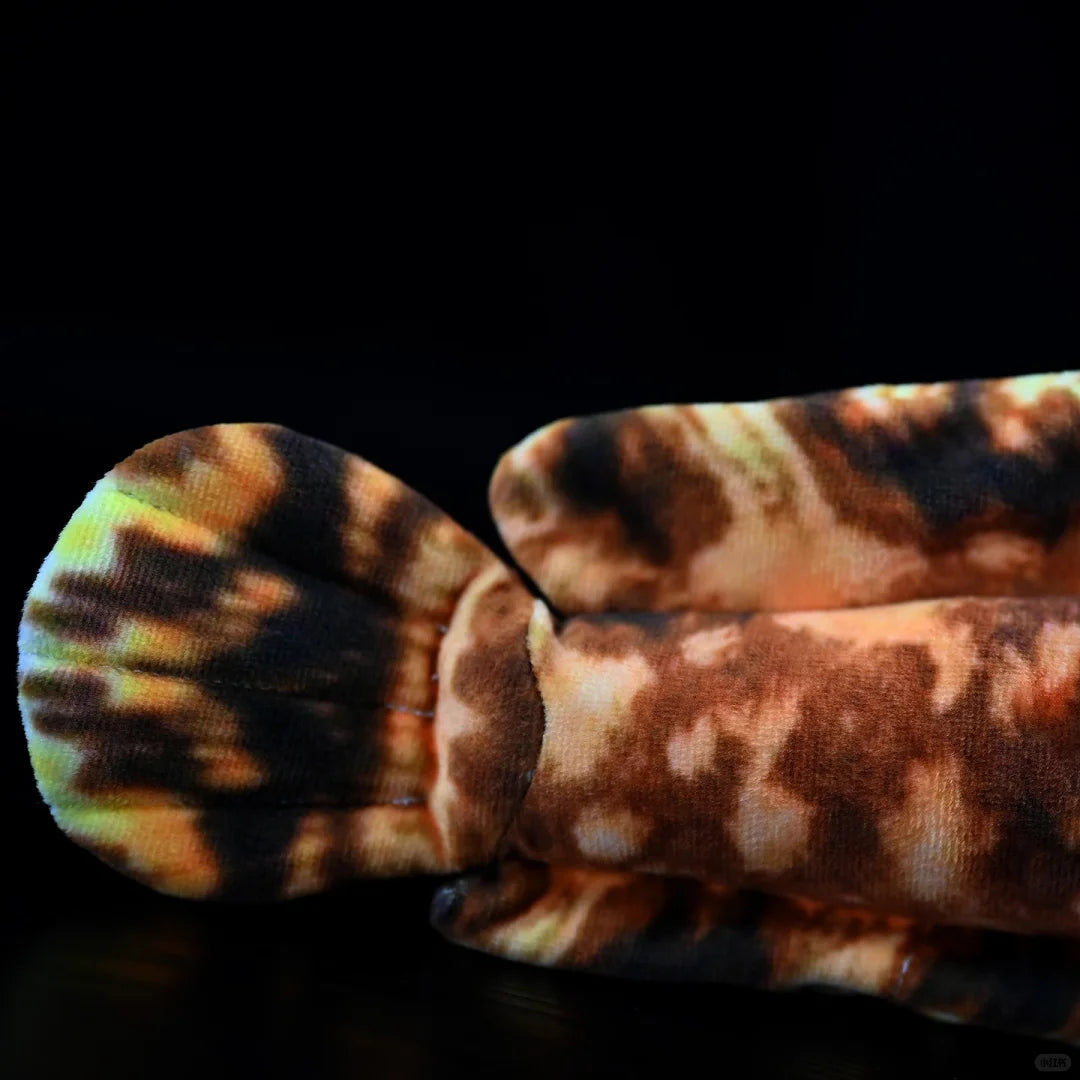 Close-up of the tail of the Japanese Warbonnet plush, showcasing its realistic texture and design