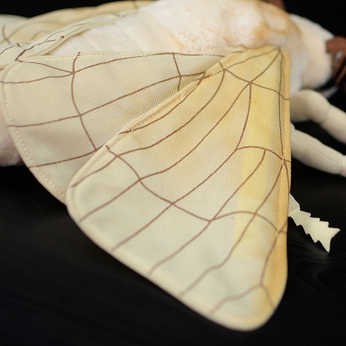 Close-up of Silk Moth plush’s delicate wings with intricate net-like patterns and premium stitching