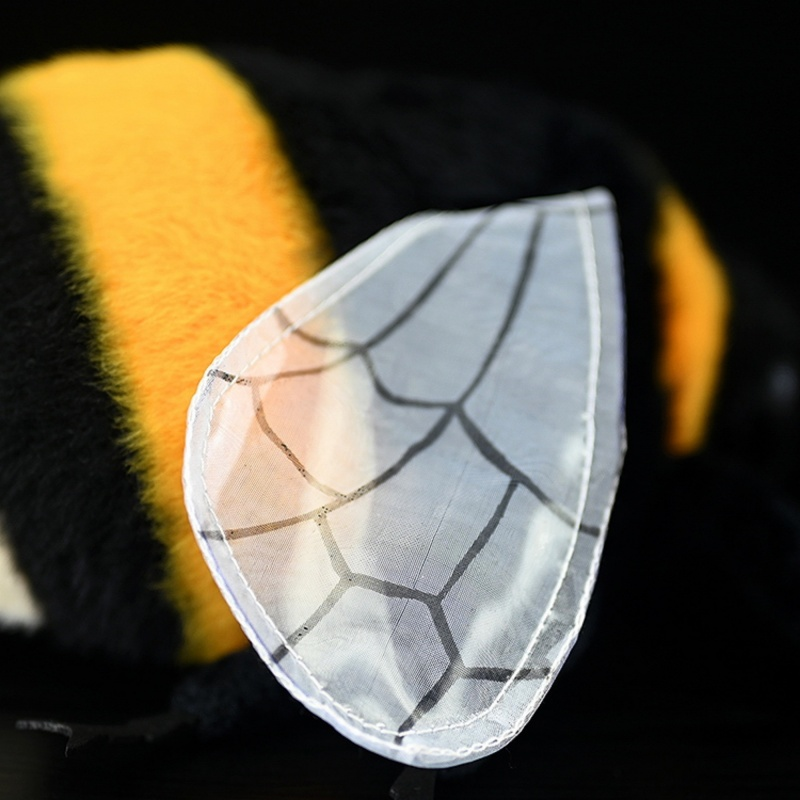 Close-up of a realistic bumblebee plush toy wing, showcasing detailed pattern and soft texture by SoftDaysLab