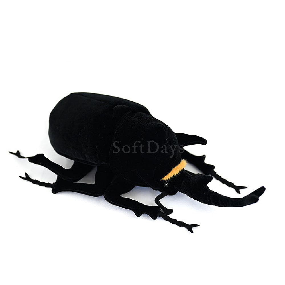 Angled view of a Mars rhino beetle plush toy, highlighting its detailed legs and lifelike design