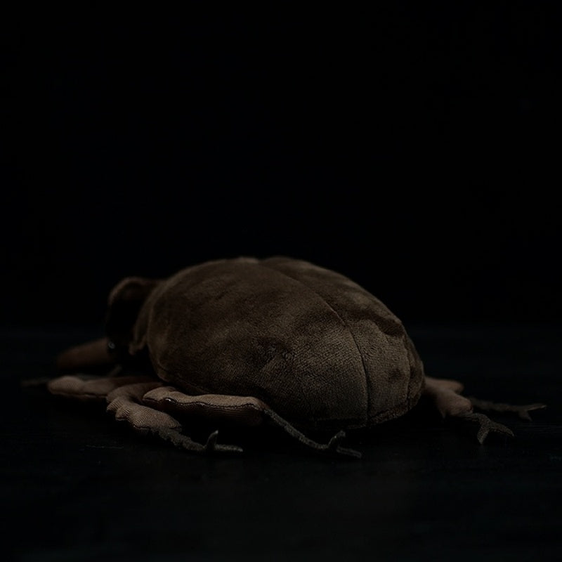 Rear angle of a stag beetle plush toy with soft fabric and detailed craftsmanship