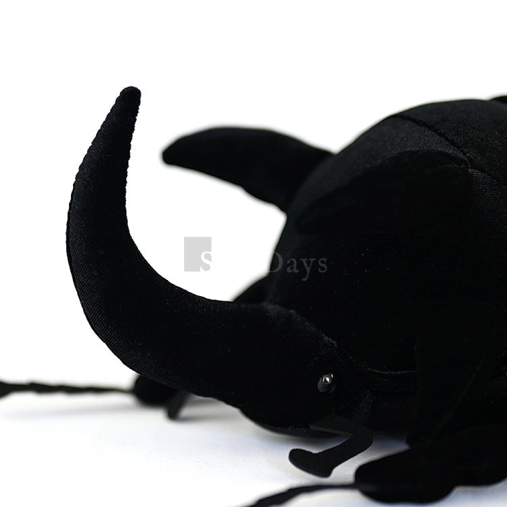 Close-up of the beetle plush's long cephalic horn, emphasizing its realistic and soft design by SoftDaysLab