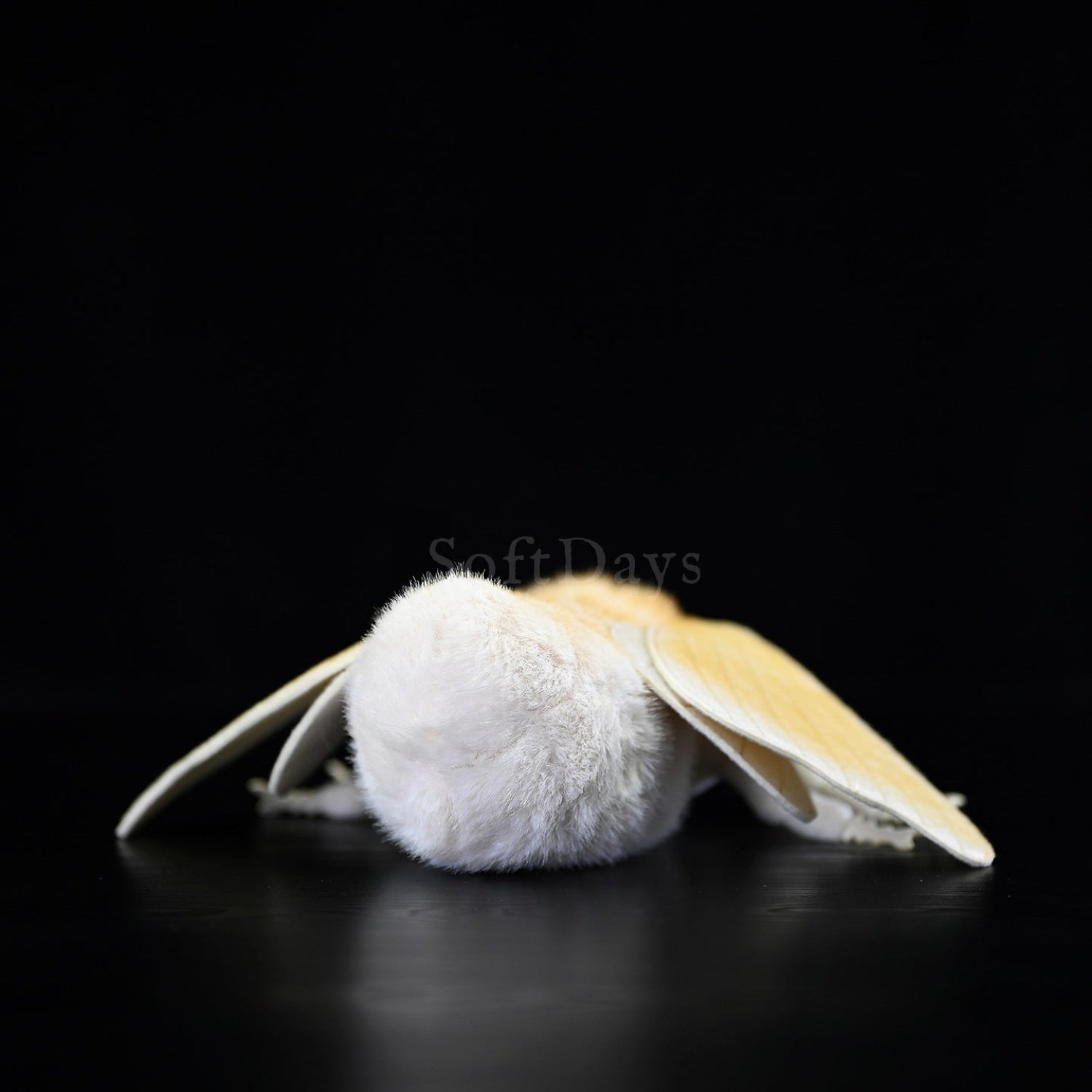 Rear view of Domestic Silk Moth plush highlighting soft, fluffy texture and natural coloring