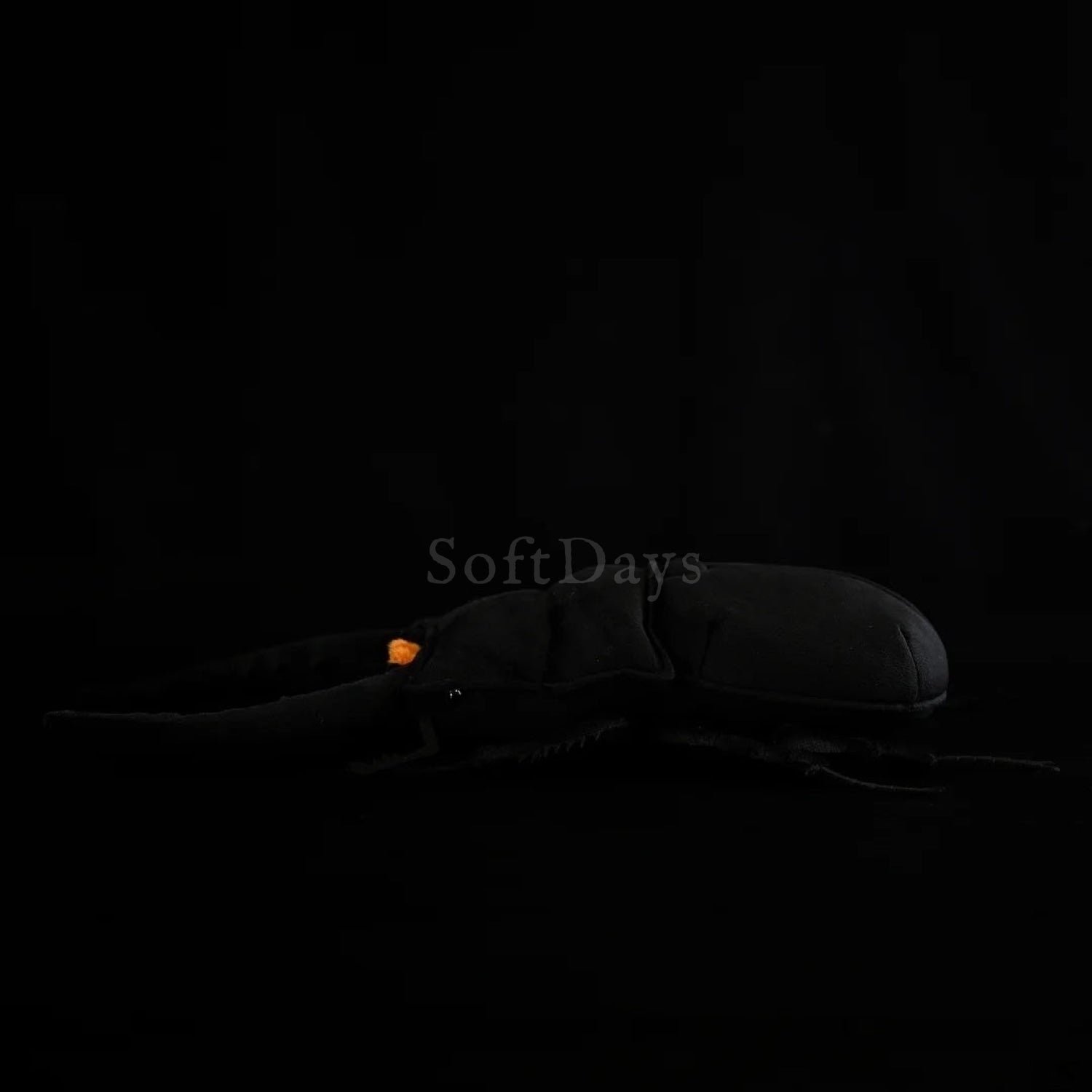 Realistic Prosopocoilus confucius beetle plush, showcasing lifelike details and soft texture