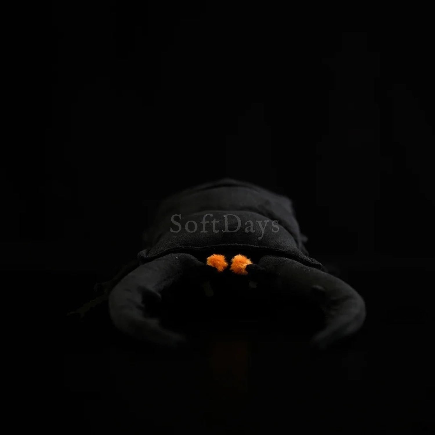 Back view of Prosopocoilus confucius plush with segmented body and striking orange mandibles