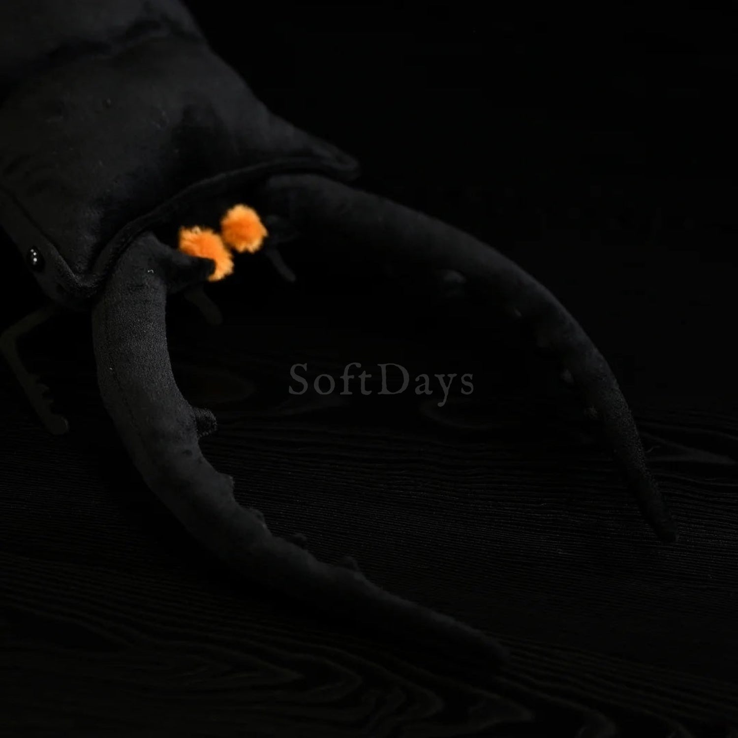 Detailed shot of lifelike Prosopocoilus confucius beetle plush pincers, perfect for insect enthusiasts