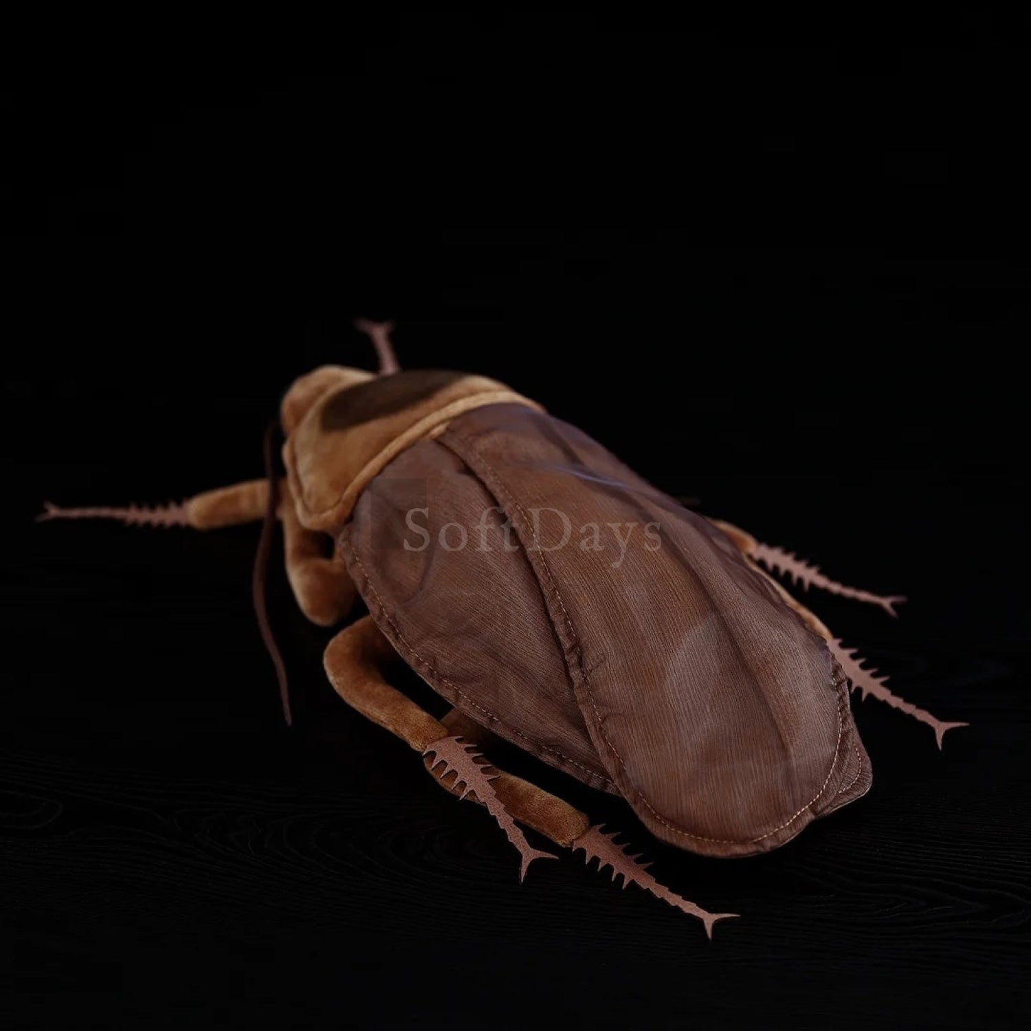 Lifelike American cockroach plush showcasing realistic wings and spiked legs