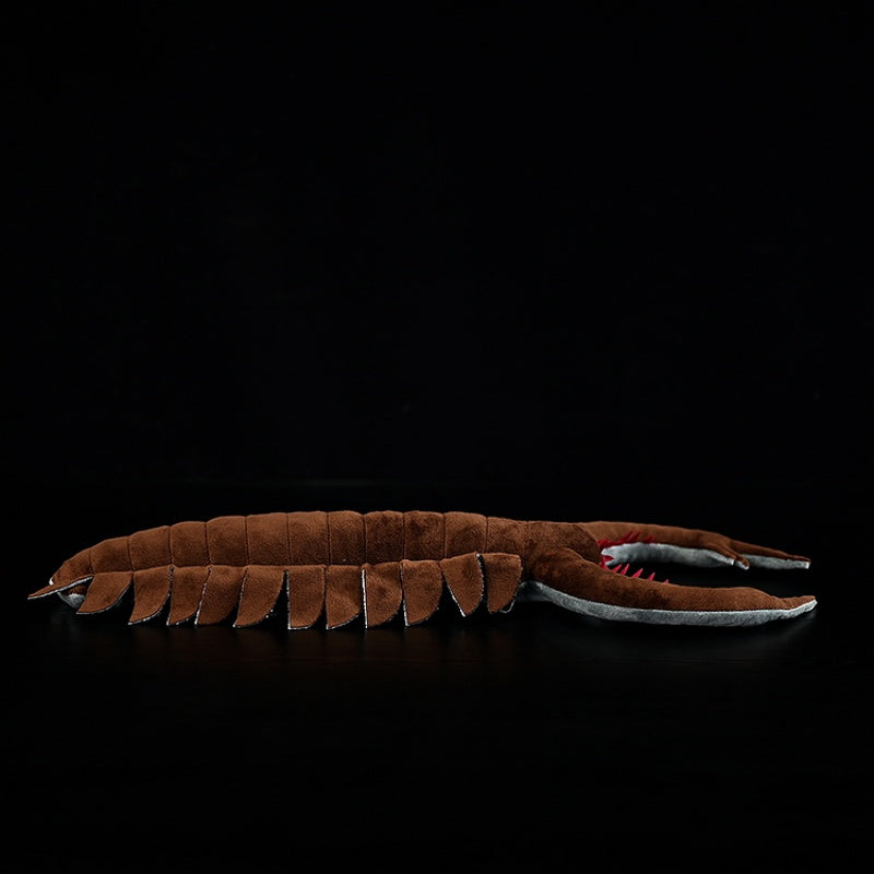 Side profile of the Omnidens stuffed animal, featuring its lifelike body flaps and curved claws by SoftDaysLab