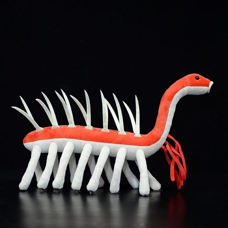 Detailed profile of the Hallucigenia plush toy, featuring its spines, legs, and realistic prehistoric shape by SoftDaysLab