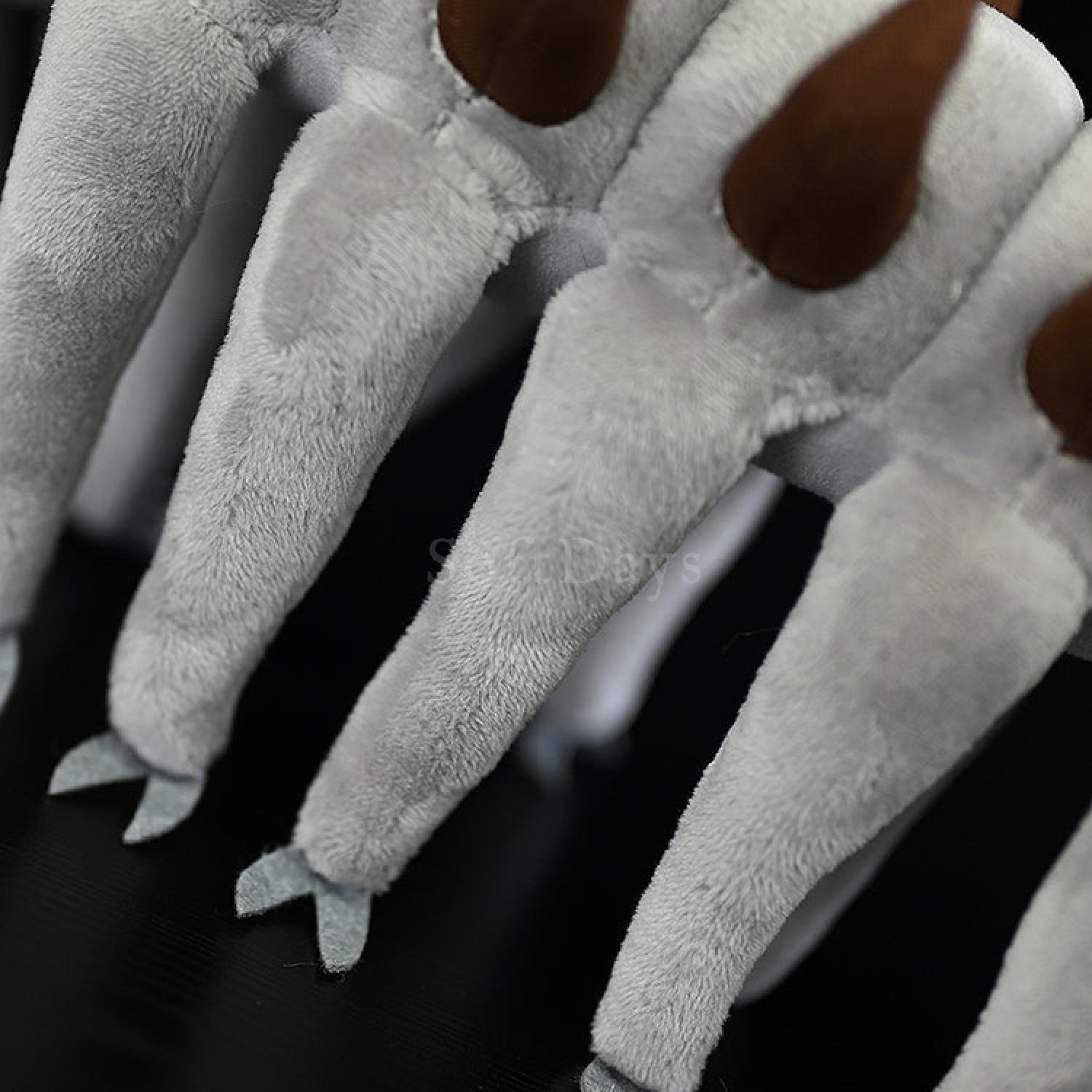Detailed view of the Onychodictyon plush toy’s legs, showcasing its realistic segmented design