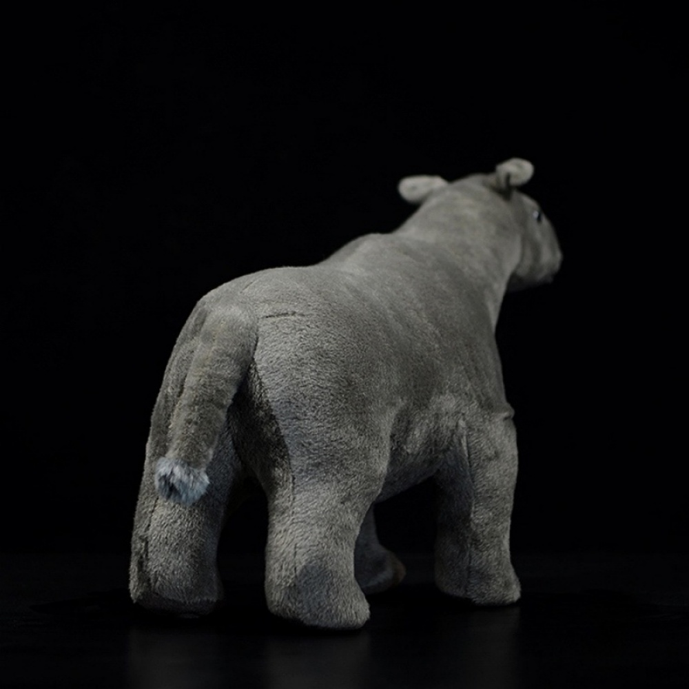 Rear view of Paraceratherium plush toy highlighting its stubby tail and sturdy plush body