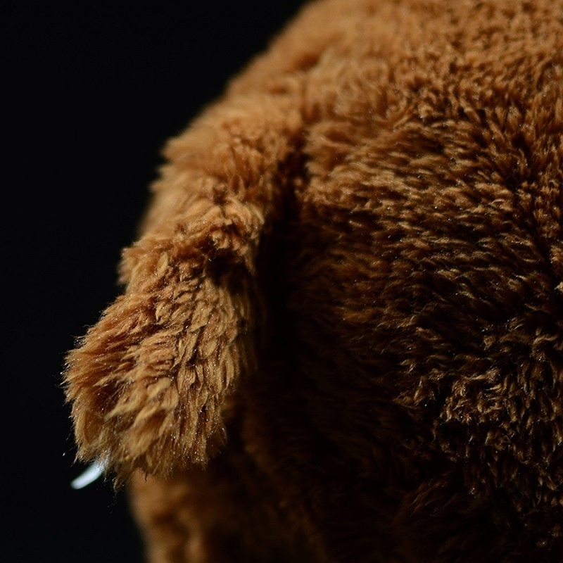 Rear close-up of woolly mammoth plush toy’s tail and fluffy fur details, crafted by SoftDaysLab