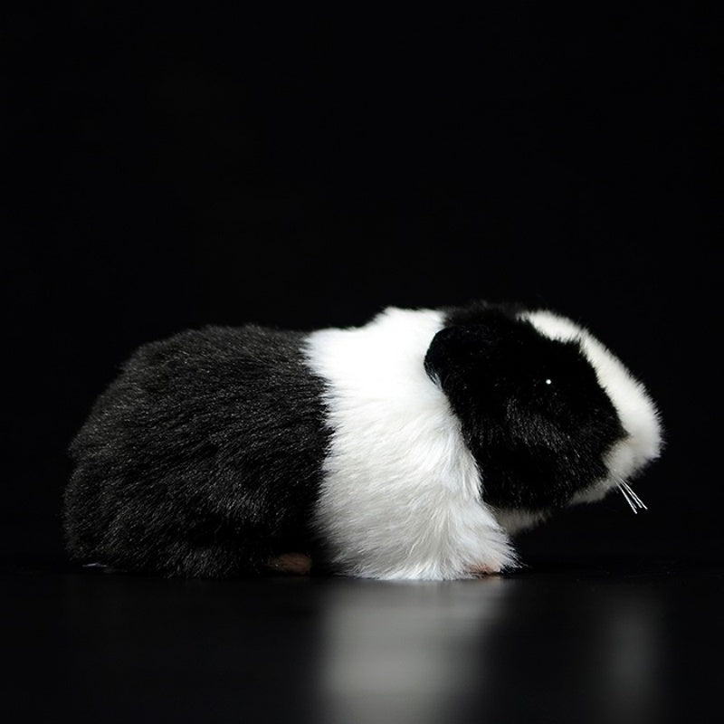 Side profile of a black and white guinea pig plush toy with detailed fur texture, ideal for animal lovers by SoftDaysLab