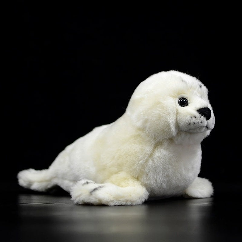 Soft and realistic white seal pup plush toy shown in a side view, ideal for animal lovers, by SoftDaysLab