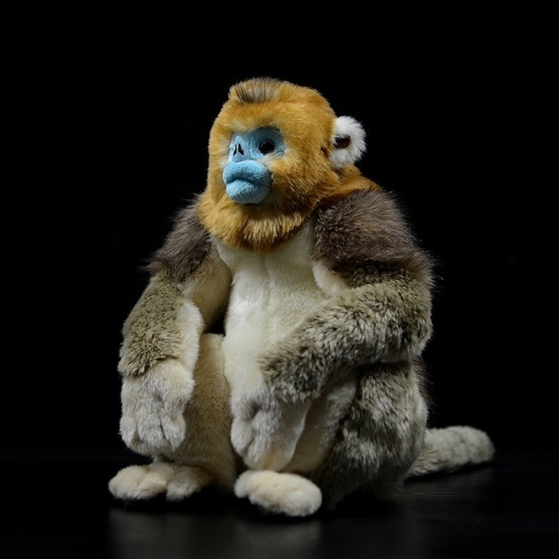 Three-quarter view of a golden snub-nosed monkey plush toy with soft, realistic fur and vibrant colors by SoftDaysLab
