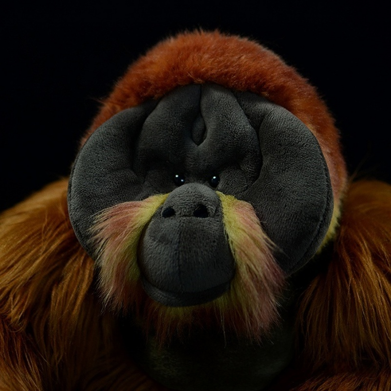 Close-up of orangutan plush toy’s face emphasizing its realistic expression and detailed craftsmanship by SoftDaysLab