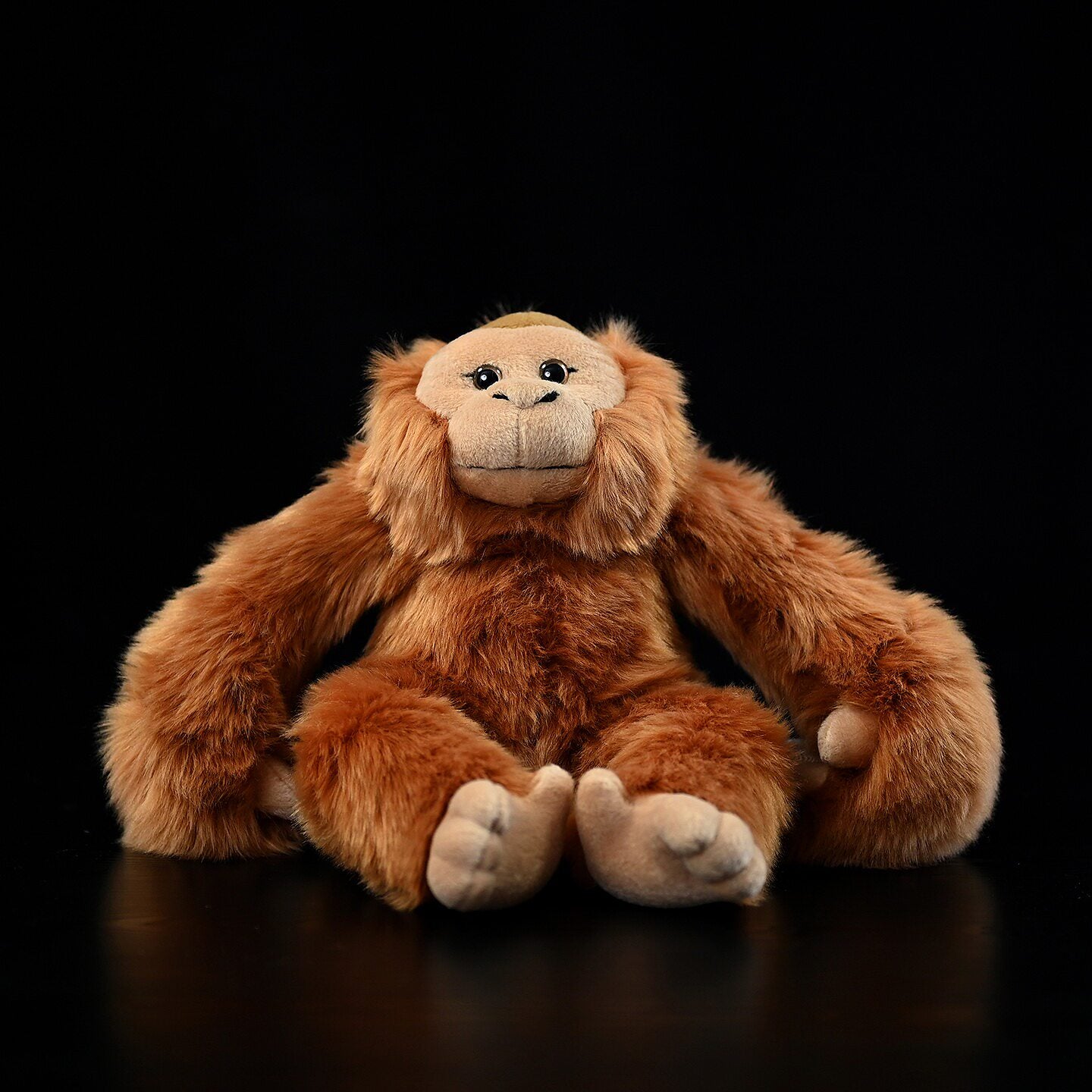 Front view of realistic hanging orangutan plush toy by SoftDaysLab, ultra-soft and adorable