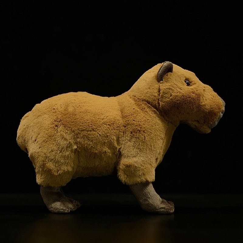 Side profile of a realistic capybara plush toy with soft texture and adorable design by SoftDaysLab