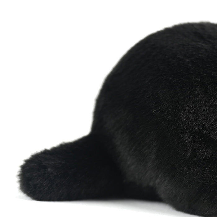 Close-up of the mole plush toy's fluffy tail, adding to its realistic and huggable design
