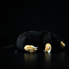 Back view of a lying mole plush toy, highlighting its soft texture and detailed tail design