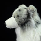 Close-up of Blue Merle Border Collie plush’s ear and fur texture, emphasizing its realistic details